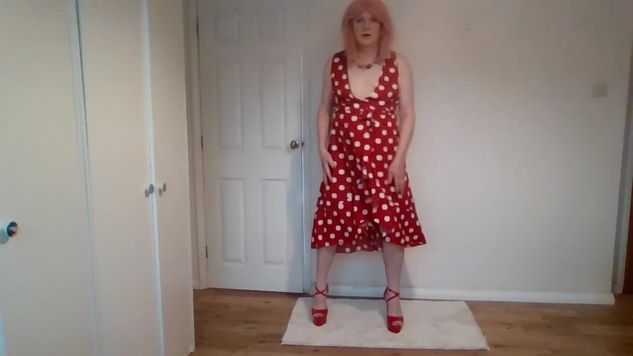 Nude striptease from red polka dress and G-string